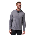A man with short hair and a beard smiles in the TravisMathew The Heater Quarter Zip Mens Long Sleeve Polo by Travis Mathew, paired with black pants, against a white background.