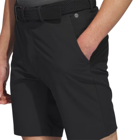 Close-up detail of the black Adidas Ultimate365 8.5-Inch Men's Golf Shorts, showing the side pocket, stitching, and a woven black belt.