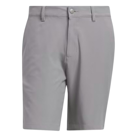 The Adidas Ultimate365 8.5-Inch Men's Golf Shorts in grey, featuring a clean design with front pockets, belt loops, and a button closure, front view.