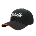 The Volvik Cap | Black/White features white embroidered front letters, orange brim trim, and a lightweight adjustable fit for comfort all day on or off the golf course.