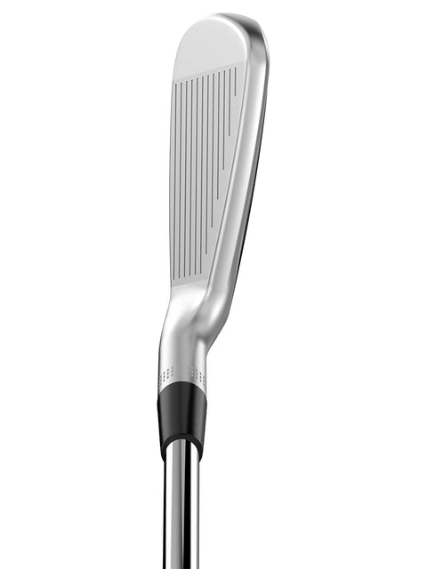 A close-up of the Wilson 2024 Men's Staff Model Utility Iron club head with horizontal grooves and a black and silver shaft highlights this Wilson tour-inspired golf club against a white background.