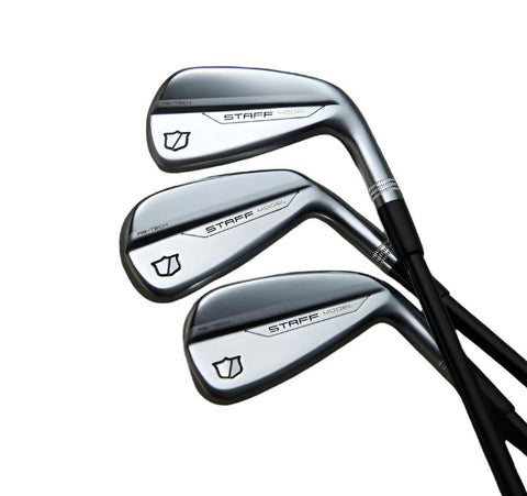 Three silver Wilson 2024 Men's Staff Model Utility Irons by Wilson with tour-inspired design are displayed in a fan shape on a white background. Each features a black shaft and a small shield logo near the clubhead heel.