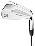A close-up of a silver Wilson 2024 Staff Model Blade Iron from the 4-PW set, featuring a shield logo on the back of the forged clubhead and a black and silver shaft. Brand: Wilson.