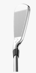 A close-up of the Wilson 2024 Staff Model CB Irons Set (4-PW) by Wilson shows its face grooves and part of the shaft against a plain white background.