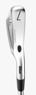 A close-up of a Wilson 2024 Staff Model CB Iron from the 4-PW set by Wilson, highlighting the silver cavity back club head with "7" and "FORGED" engraved. The grip and shaft are partially visible at the bottom.