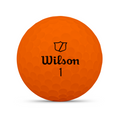 An orange Wilson 2025 DUO Soft Golf Ball, featuring the Wilson logo and black number 1 on its dimpled surface, offers an ultra-soft feel and maximum distance, displayed against a white background.