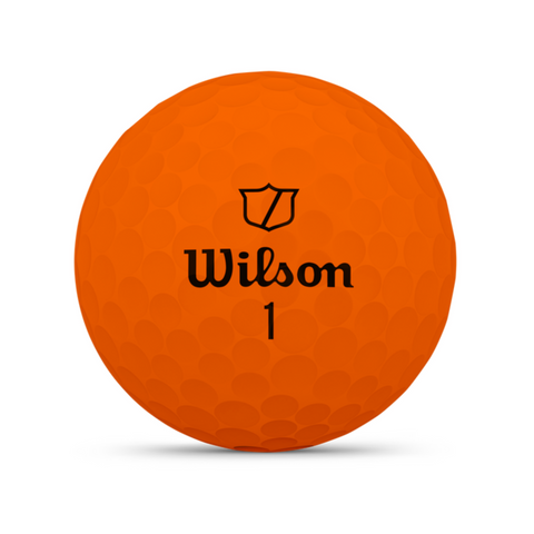 An orange Wilson 2025 DUO Soft Golf Ball, featuring the Wilson logo and black number 1 on its dimpled surface, offers an ultra-soft feel and maximum distance, displayed against a white background.