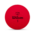 A red Wilson 2025 DUO Soft Golf Ball with a dimpled surface, displaying the Wilson logo and number 1 in black, is designed for an ultra-soft feel and maximum distance.