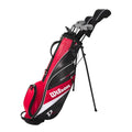 A Wilson 2025 Deep Red Junior Set (12-14 Years, Red) includes a red, black, and white golf bag with stand, shoulder strap, and zippered pockets, plus several junior clubs. Brand: Wilson.