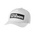The Wilson 2025 Golf Performance Cap is a white baseball cap with a black Wilson patch, featuring mesh back and sides for lightweight breathability—ideal for all-day comfort on the golf course.
