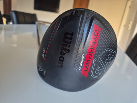Actual used Wilson DYNAPWR Carbon 10.5 driver sole angle showing minimal wear