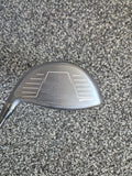 Face of a used Wilson Dynapwr 9 degree driver showing strike wear