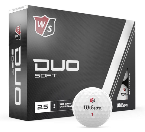 A box of Wilson Duo Soft Golf Balls – Prior Generation by Wilson, featuring a white ball labeled 1 in front. The black, white, and gray packaging with red accents showcases these soft golf balls designed for straighter shots.
