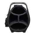 Top-down view of the Wilson Exo Lite Stand Bag in Black/Charcoal by Wilson, featuring three large padded club compartments with mesh dividers. The handle and part of a side pocket are also visible.