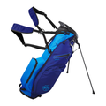The Wilson Exo Lite Stand Bag in Dark Blue/Light Blue has dual shoulder straps, multiple zippered pockets, a 5-way top, built-in stand extended, lightweight design, and a WS logo on the lower front pocket, shown on a white background.