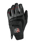The Wilson Men's Grip Plus Golf Glove by Wilson is shown palm down, fingers slightly bent, in black with red stitching and a patch featuring the letters S and M on the wrist.