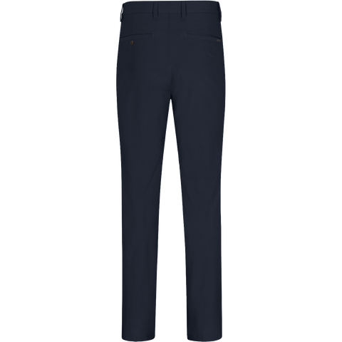 Greg Norman men's ML75 Microlux golf pants in navy — back view.