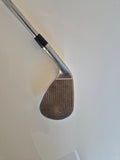 Actual Callaway Jaws Raw 54 degree wedge face showing natural surface rust and grooves