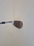 Raw face and grooves of the used Callaway Jaws Raw 56 degree wedge with visible surface rust