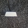 Face of used Odyssey Ai-DUAL Square 2 Square Jailbird left-handed putter