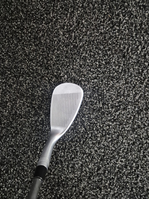 Full face of unused Wilson Staff Model 58 degree 10 bounce wedge
