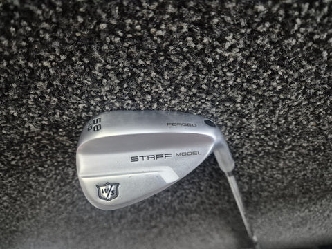 Wilson Staff Model forged 58 degree 10 bounce wedge head showing shop wear