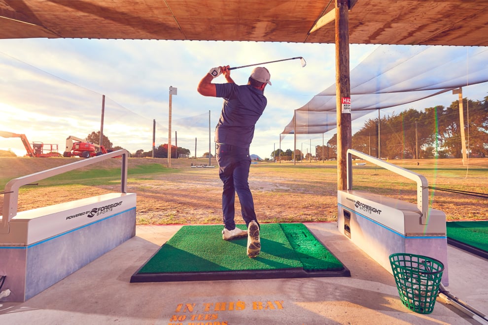 Golfer at Golf 360 driving range