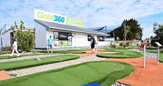 People play on the mini golf course at Golf three sixty.
